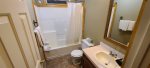 Full size bathroom with a shower/tub combo.